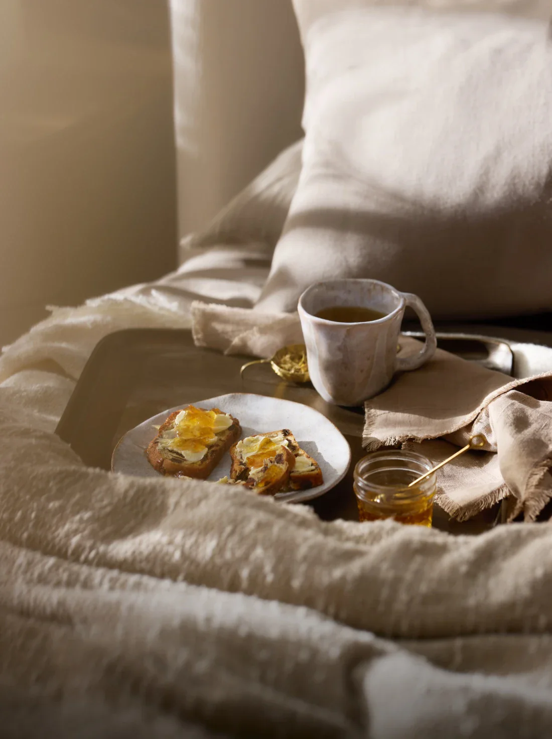 Quiet moment having breakfast in soft bed
