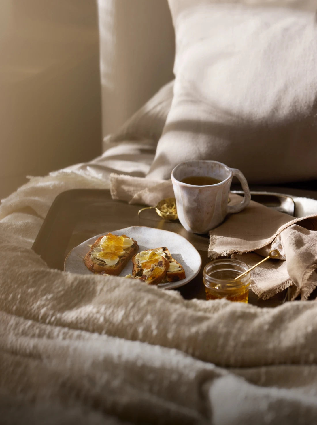 Quiet moment having breakfast in soft bed