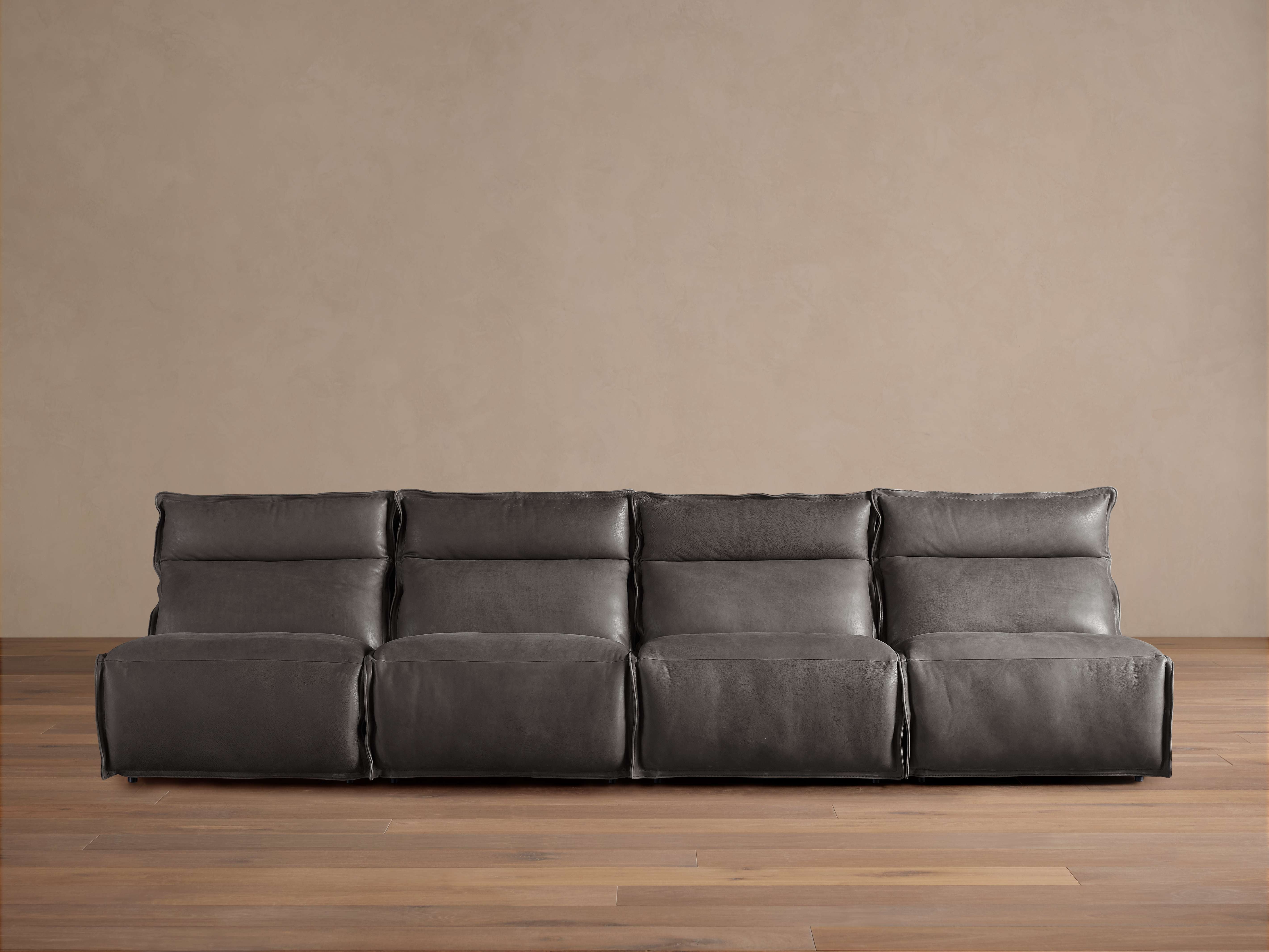 Rowland Leather 4-Piece Armless Motion Sofa