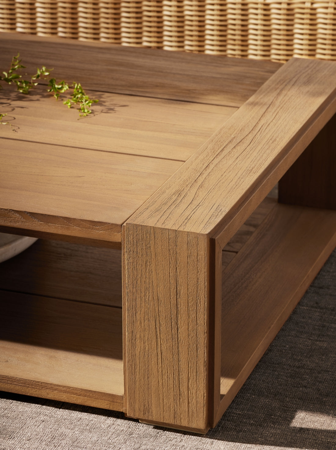 In-stock outdoor furniture with ready-to-ship seating and dining pieces, styled in a relaxed, sunlit environment.