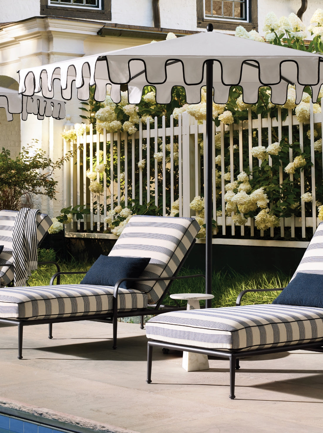 Outdoor umbrellas shading seating areas, combining function and style in a bright open-air setting.