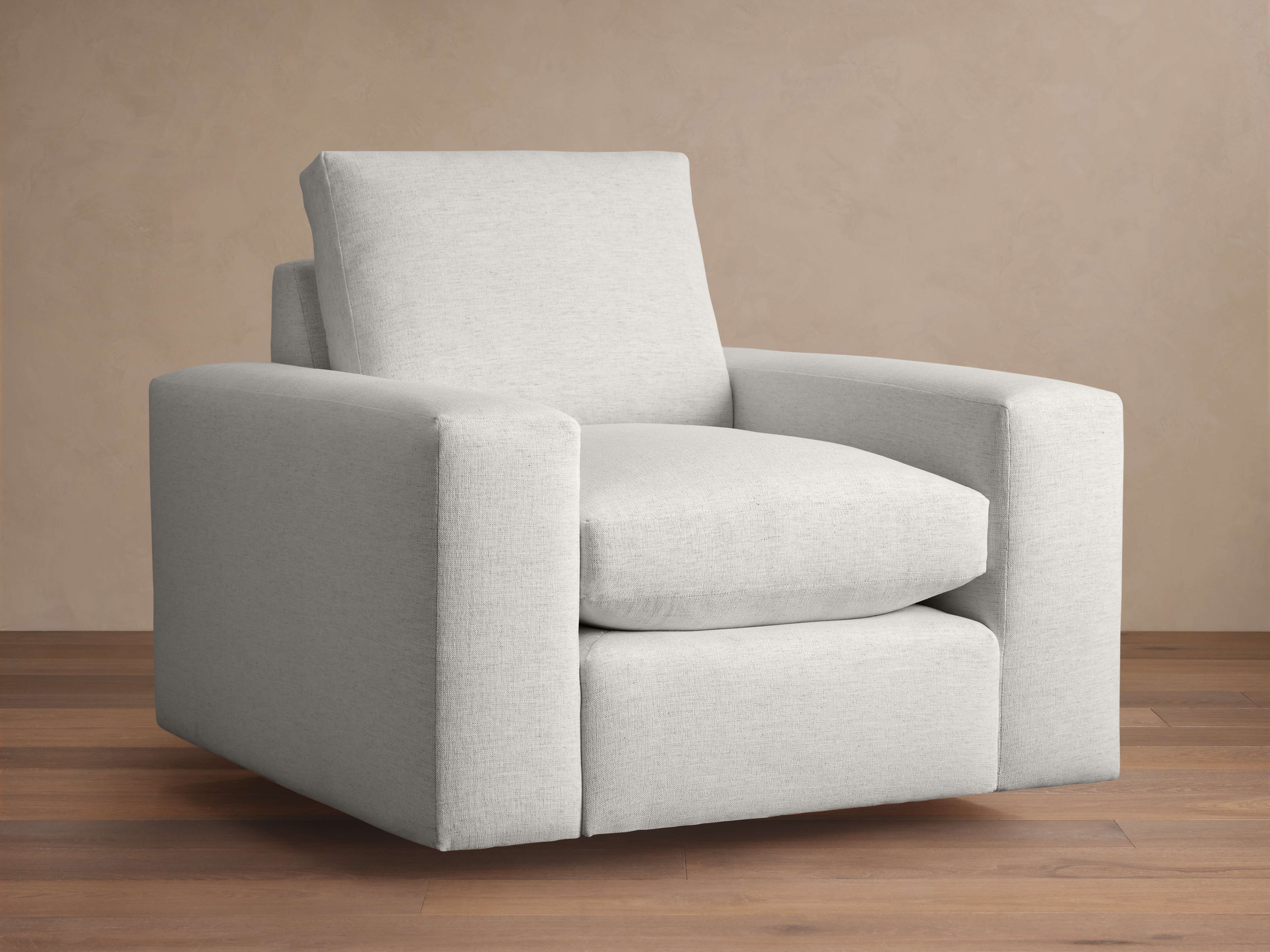 Kipton Wide Arm Swivel Chair in Nomad Snow – Arhaus